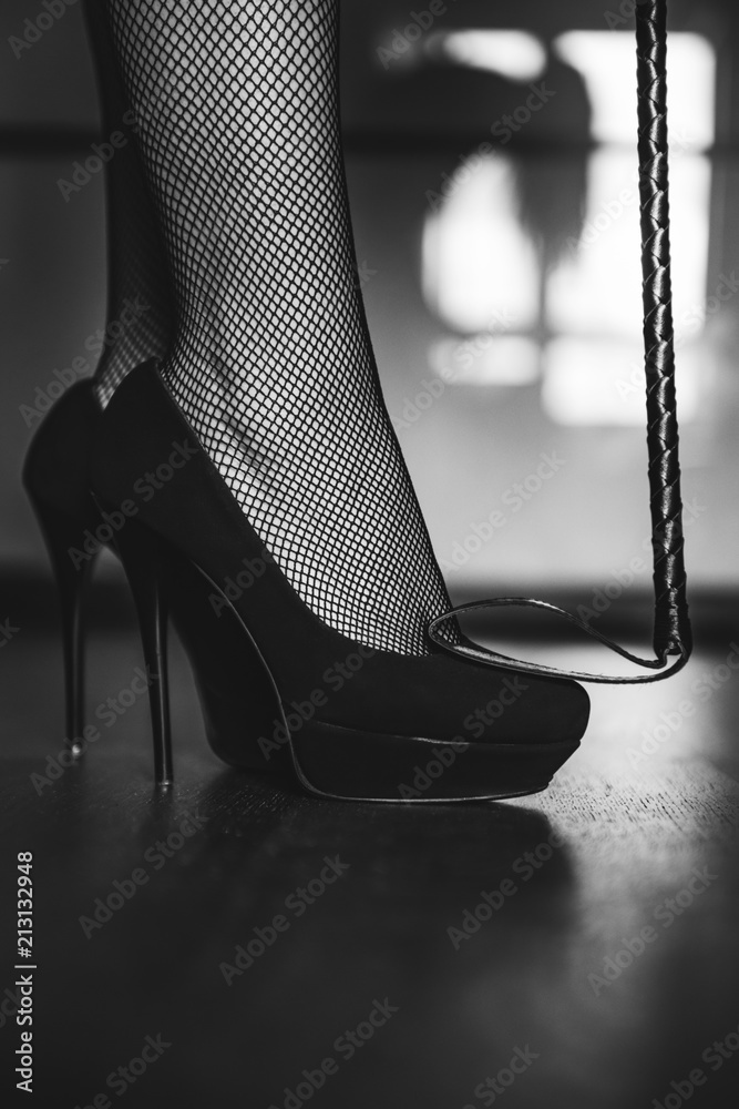 Dominant Woman In Black Fishnet Stockings And High Heels With Riding Dominant Woman In Black Fishnet Stockings And High Heels With Riding
