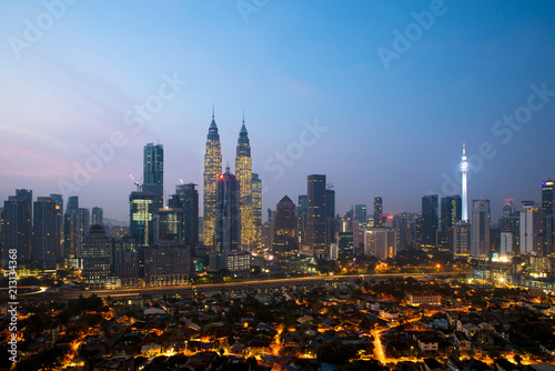 Kuala lumpur cityscape. Panoramic view of Kuala Lumpur city skyline during sunrise viewing skyscrapers building and Petronas twin tower in Malaysia.