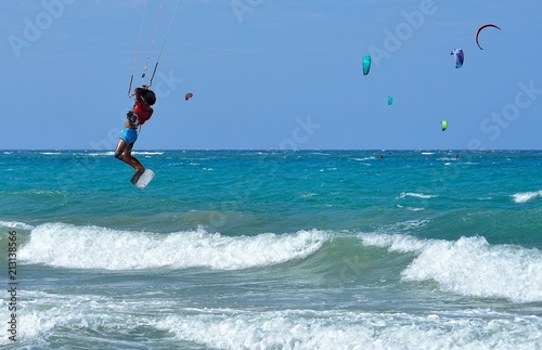 6 June 2018, Cabarete Beach, Dominican Republic, Kite surfers on the beach. photo
