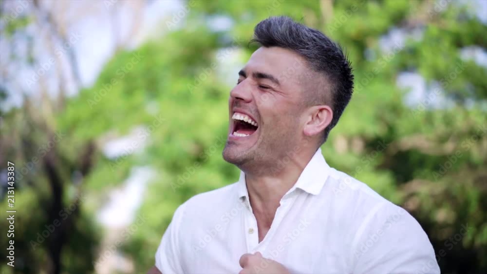 Handsome man showing Positive Shock emotions. Young attractive man crying with happiness. Close up. Handsome man showing Positive Shock emotions. Young attractive man crying with happiness. Close up.