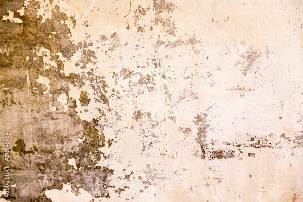 Fototapeta premium Peeling Paint on an Ancient Plastered Wall
