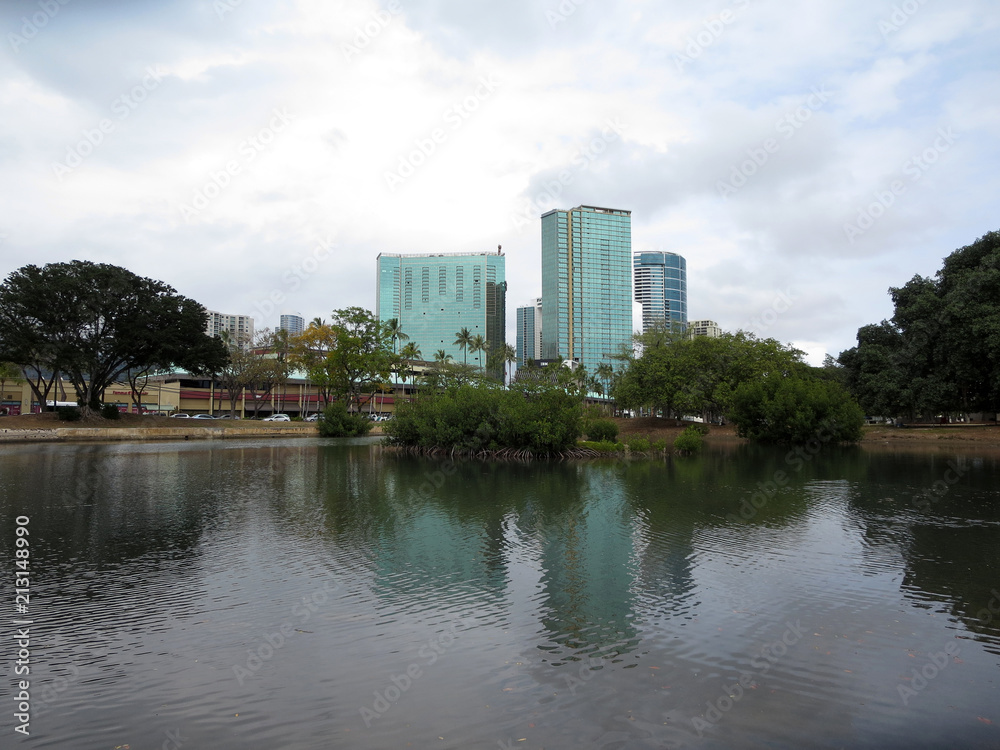 Pond in Ala Moana Beach Park with Condominiums towers across the street