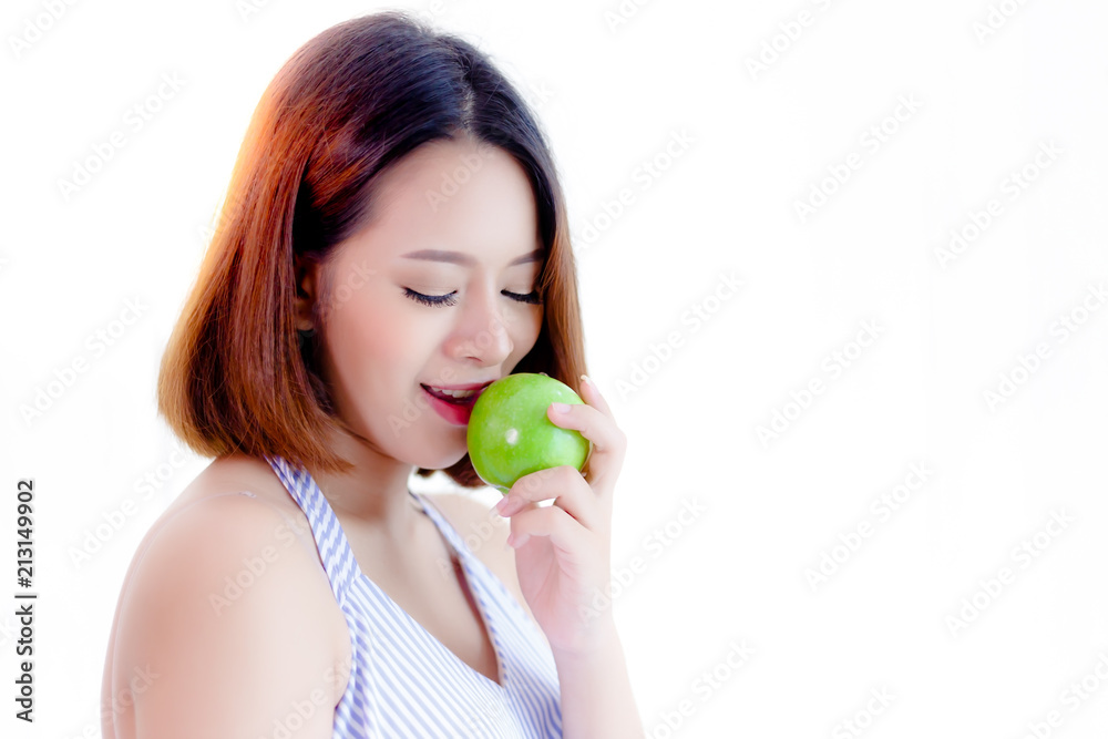 Portrait charming beautiful woman: Attractive mother bites and eats green apple. Gorgeous girl loves to eat fruits for her healthy. Pretty girl feels relaxed and happy, white or isolated background Portrait charming beautiful woman: Attractive mother bites and eats green apple. Gorgeous girl loves to eat fruits for her healthy. Pretty girl feels relaxed and happy, white or isolated background