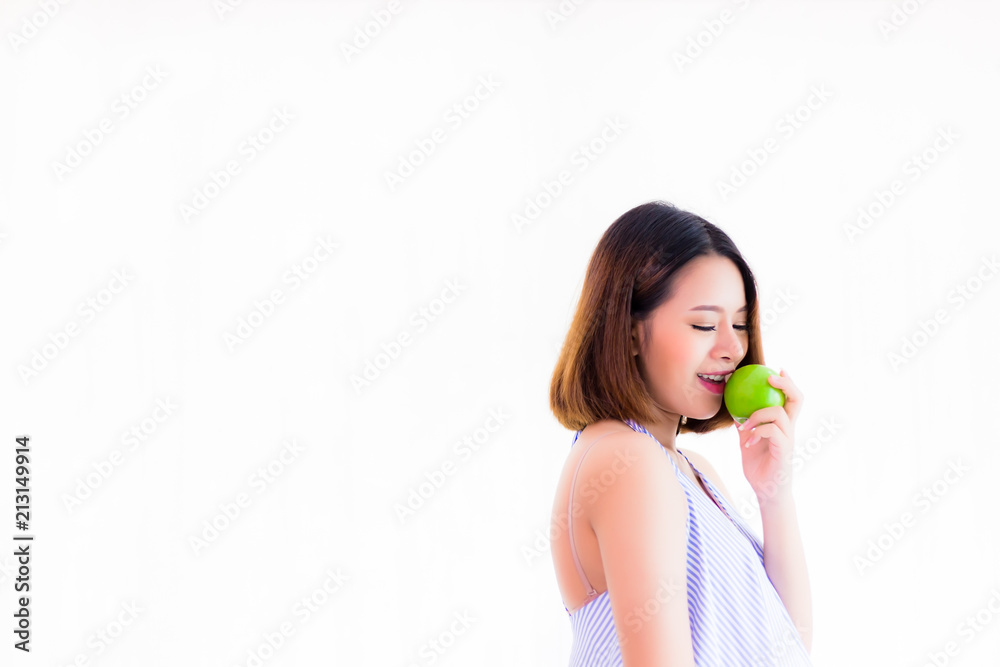 Portrait attractive beautiful woman: Charming girl eats apple. Pretty female loves to eat healthy food, makes her get strong health. Gorgeous girl looks sexy and relaxed, isolated and white background Portrait attractive beautiful woman: Charming girl eats apple. Pretty female loves to eat healthy food, makes her get strong health. Gorgeous girl looks sexy and relaxed, isolated and white background