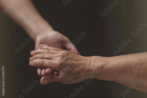 Fotografie Nurse assistant helping grandmother