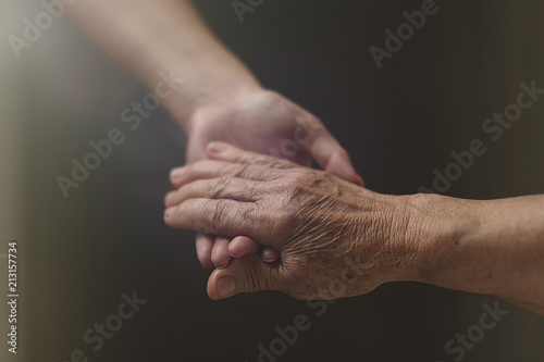 Fotografie Nurse assistant helping grandmother