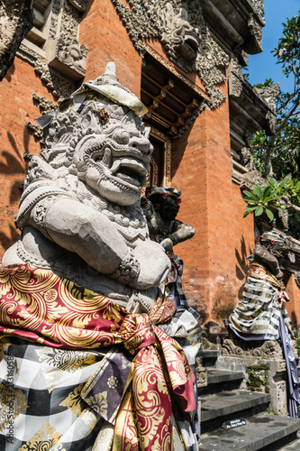 Traditional Balinese Hindu sculpture outside a temple in Ubud, the cultural center of Bali in Indonesia. © jakartatravel
