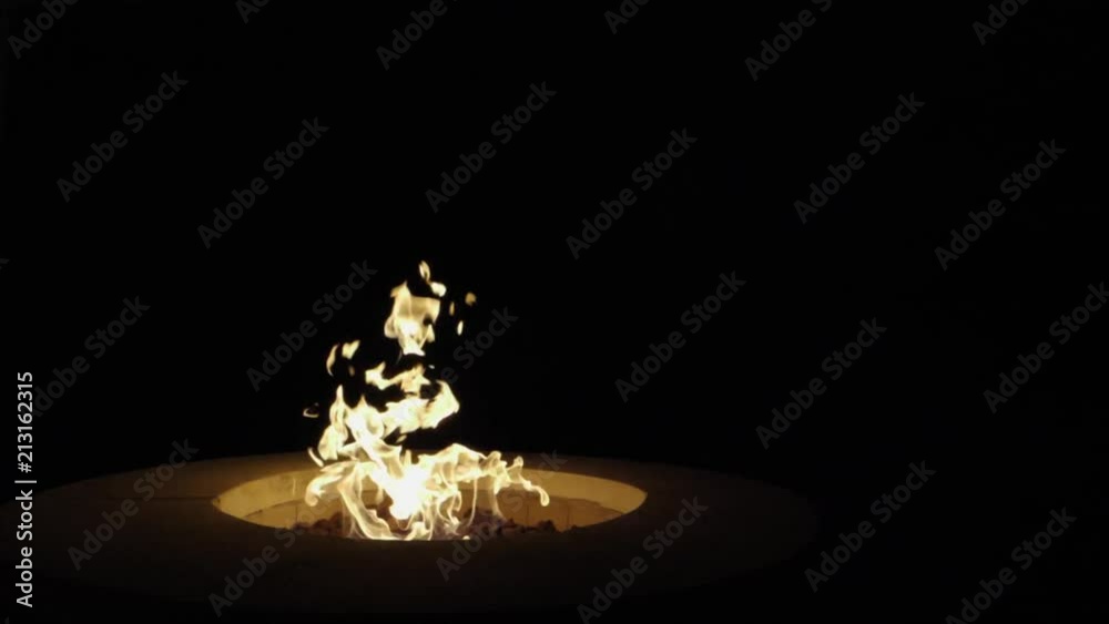 Fire pit on left third of screen in slow motion (120FPS). Fire pit on left third of screen in slow motion (120FPS).
