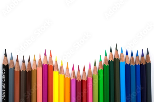 Colored pencils on white background, and space for text or image