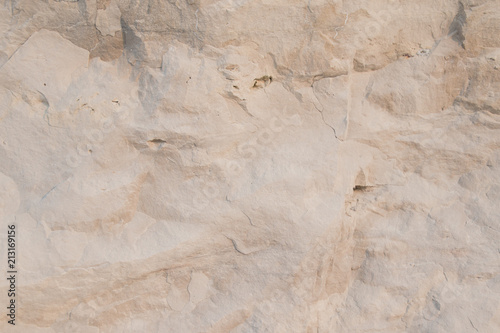 Closeup limestone rock face showing weathered strata Geology walpaper or background photo