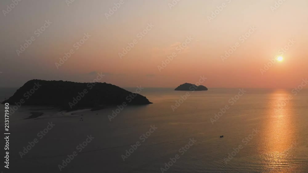 Time lapse Along the sea against the backdrop of the sunset and islands. Boat in the sea at sunset Time lapse Along the sea against the backdrop of the sunset and islands. Boat in the sea at sunset