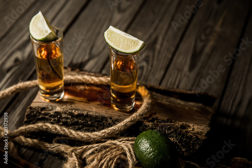 Elite tequila in a pile with lime