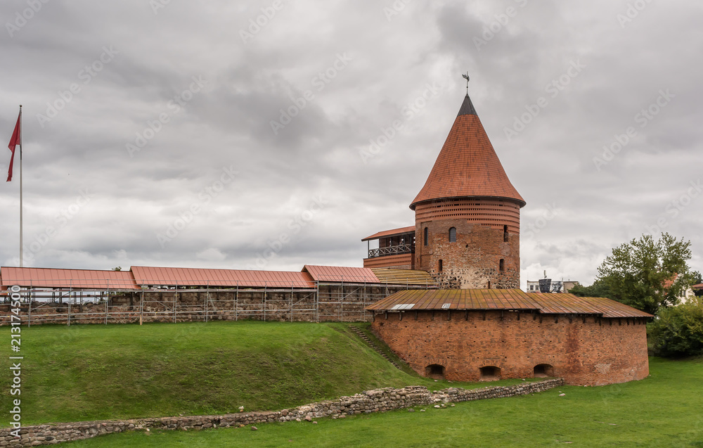 The round tower and the bastion of the mid-14th century, Gothic style medieval castle situated in Kaunas, the second-largest city in Lithuania.