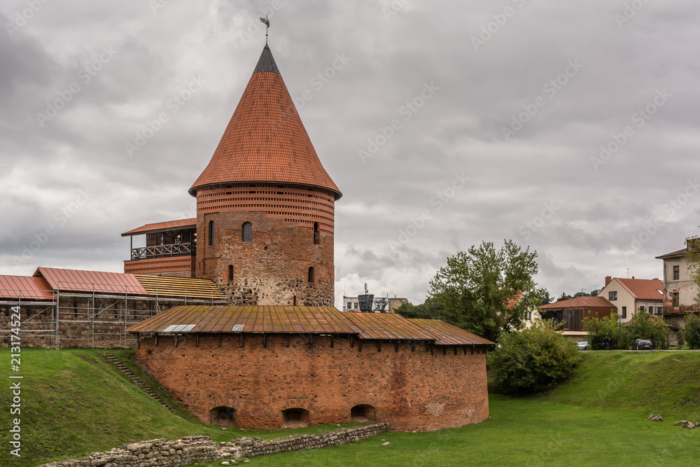 The round tower and the bastion of the mid-14th century, Gothic style medieval castle situated in Kaunas, the second-largest city in Lithuania.