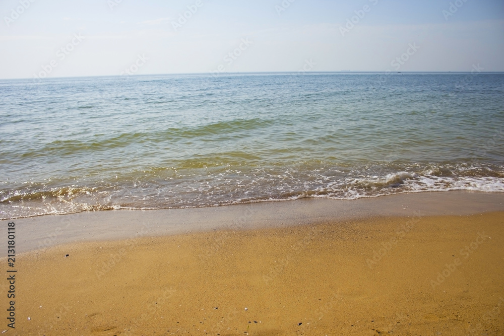 Soft wave of the sea on the sandy beach