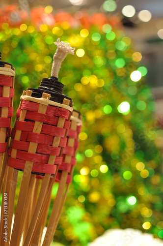 Bamboo Torches at Malay wooden house during Hari Raya Festival