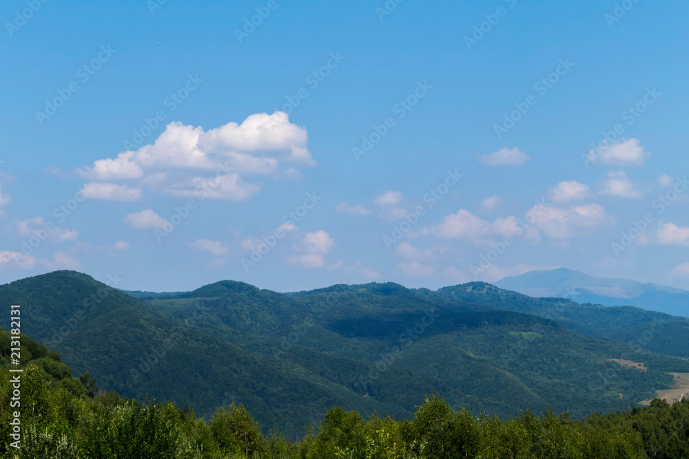 magnificent scenery of mountain slopes in the silence of a deep blue sky magnificent scenery of mountain slopes in the silence of a deep blue sky