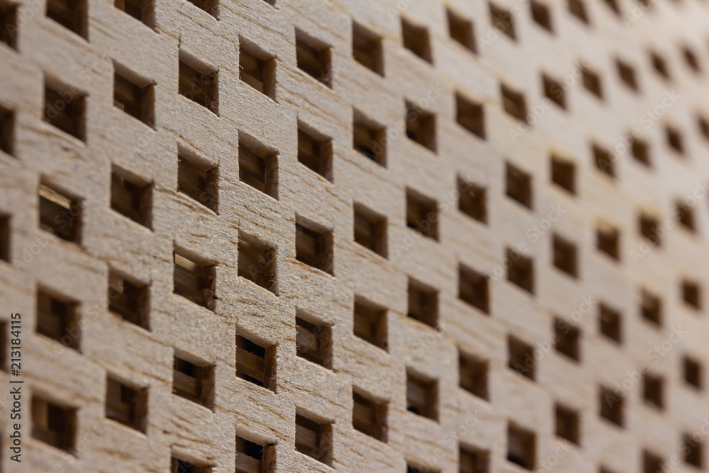 Wood background with grid square hole Wood background with grid square hole