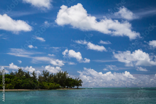 clouds in the sky over jungle and ocean  Mauritius island © Kirill