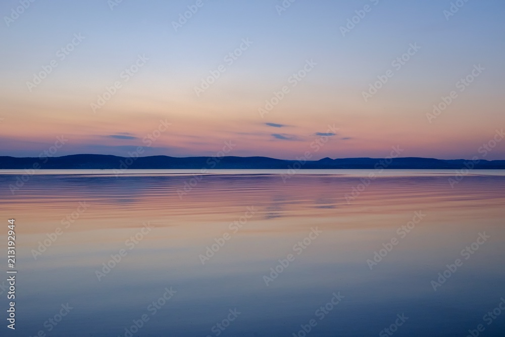 soft and calm sunset at Balaton lake in summer