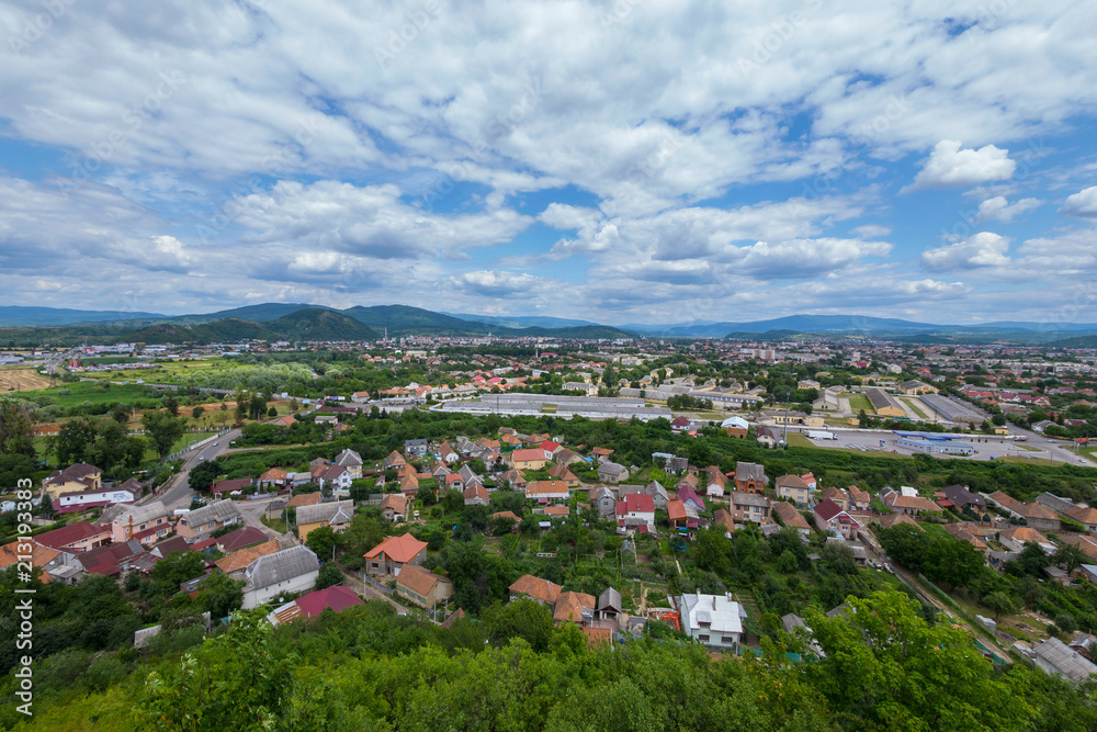 Gorodishka from one-story houses with red roofs from a bird's-eye view