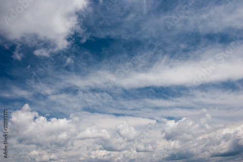 White clouds in summer blue sky photo