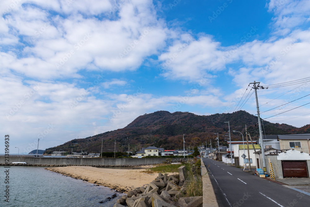 A village-vicinity mountain and blue sky in shonai peninsula,kagawa,shikoku,japan
