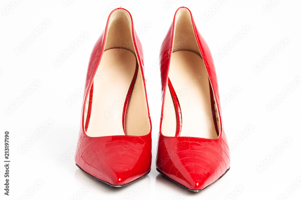 Red high heel shoes isolated on a white background. Red high heel shoes isolated on a white background.