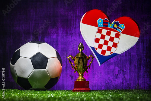 Croatia flag, golden champion’s cup and soccer ball.Concept sport. photo