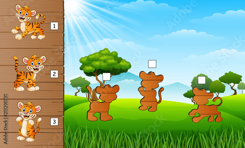 Fototapeta Naklejka Na Ścianę i Meble -  Cartoon happy baby tiger. Find the correct shadow. Educational game for children
