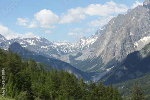 scenic view on a wide valley on Italian alps Val Ferret