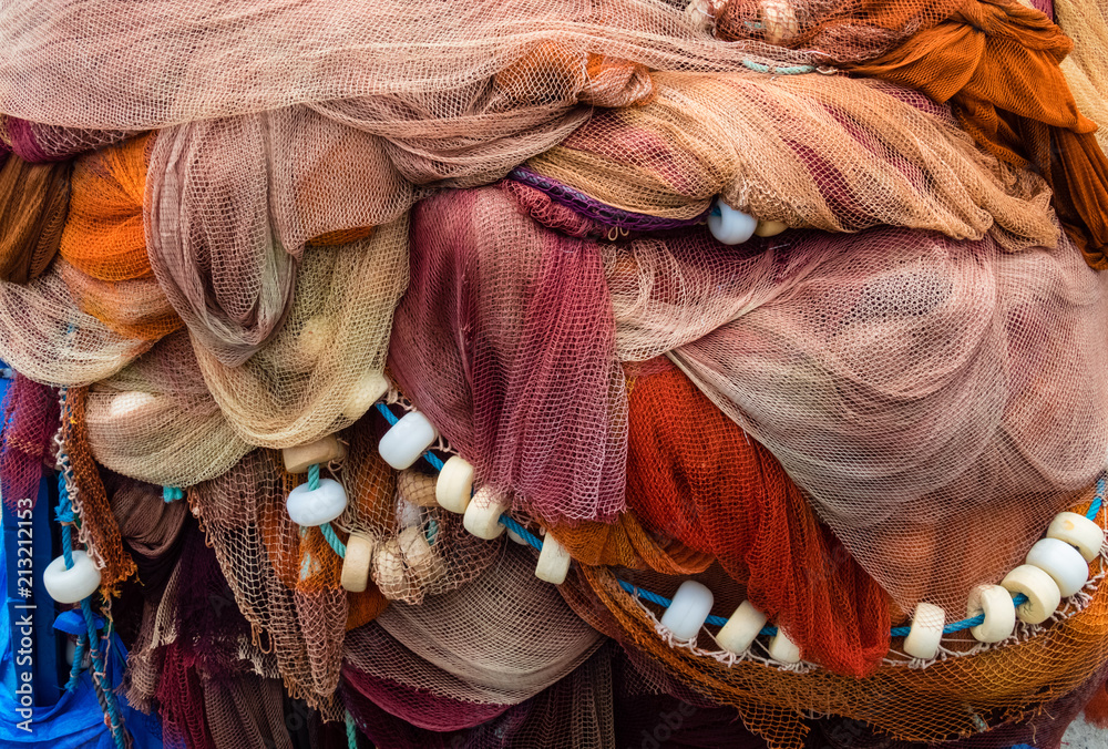 Φωτογραφία background of colorful fishing nets and floats, Bermeo Basque country Spain