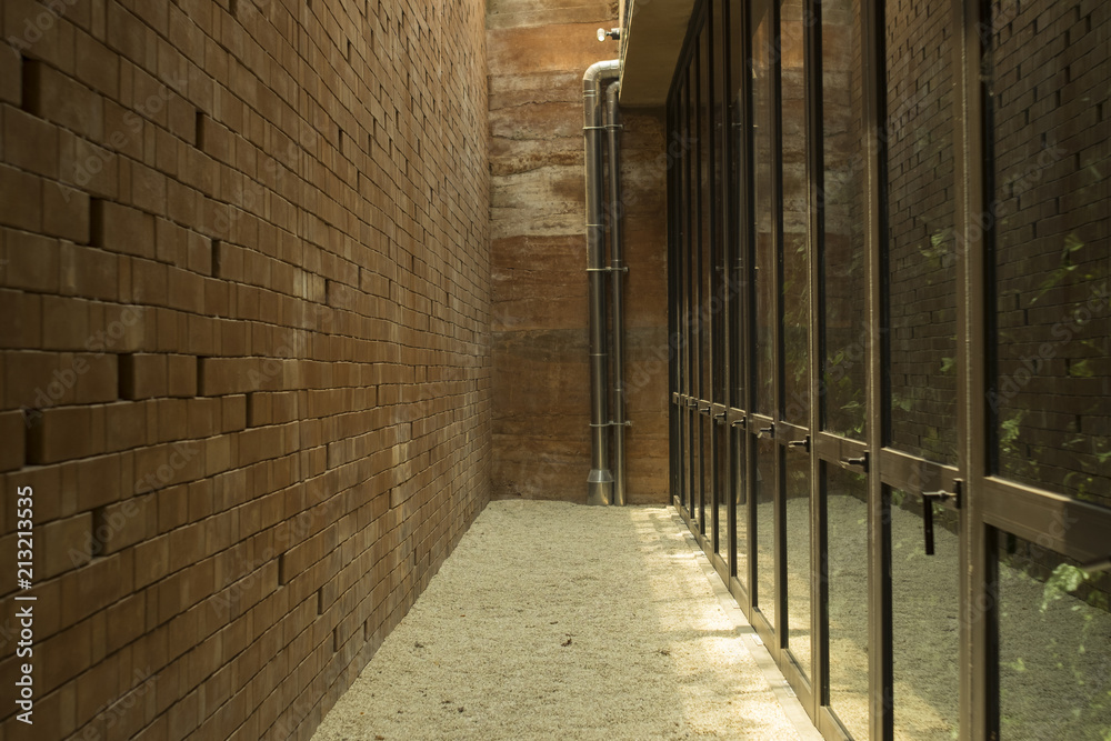 Background And Texture Of Alleyway Space Between The Brown Brick Wall And Glass Window Stock Photo Adobe Stock