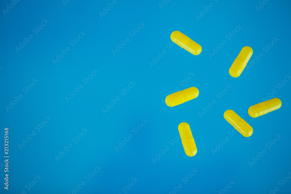 Medical Pills. Colored Pills And Capsule On Blue Background. Pharmacy Theme, Capsule Pills With Medicine Antibiotic in Packages Medical Pills. Colored Pills And Capsule On Blue Background. Pharmacy Theme, Capsule Pills With Medicine Antibiotic in Packages