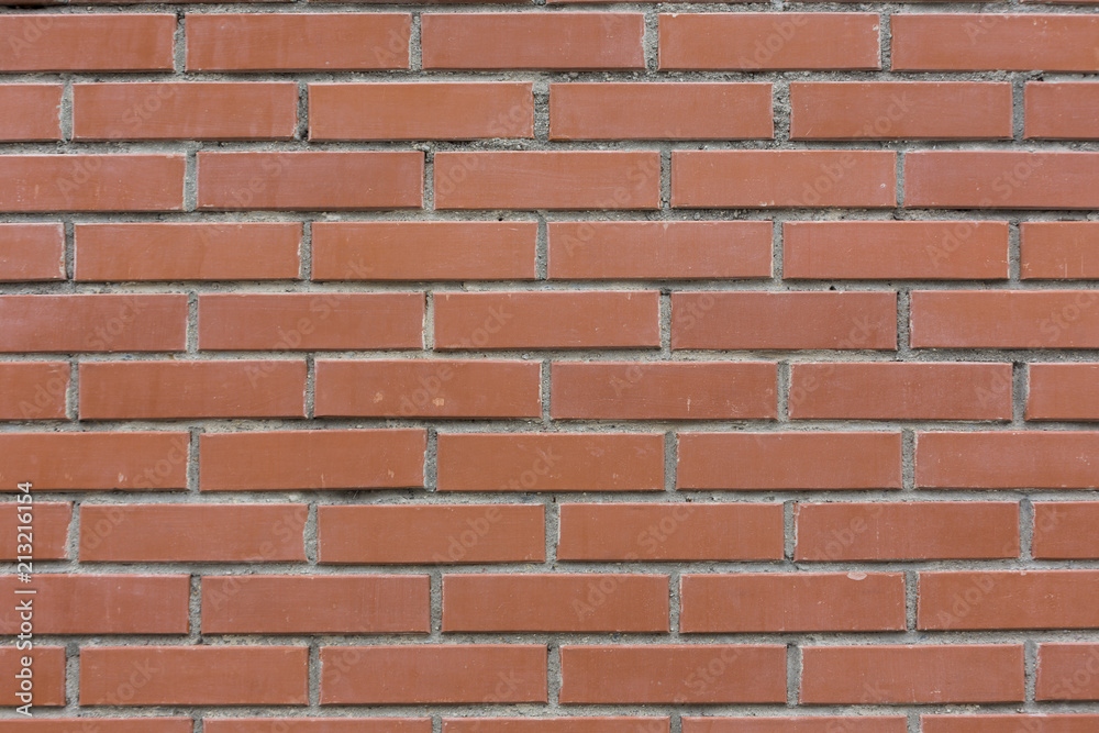 Obraz premium red stone bricks wall pattern texture background close-up
