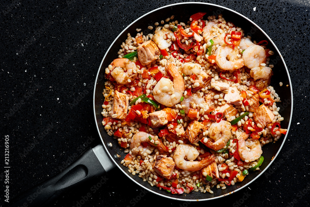 SHRIMP, PEARL BARLEY AND SALOMON ON BLACK GRANITE SHRIMP, PEARL BARLEY AND SALOMON ON BLACK GRANITE