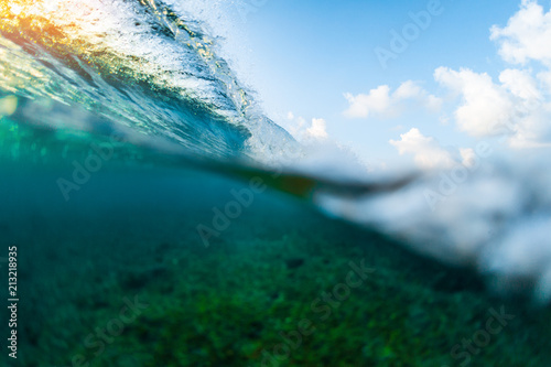 Splitted image of the ocean wave breaking over coral reef