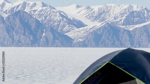 Beautiful landscape shot with a tent in the Foreground, Pond Inlet Nunavut photo