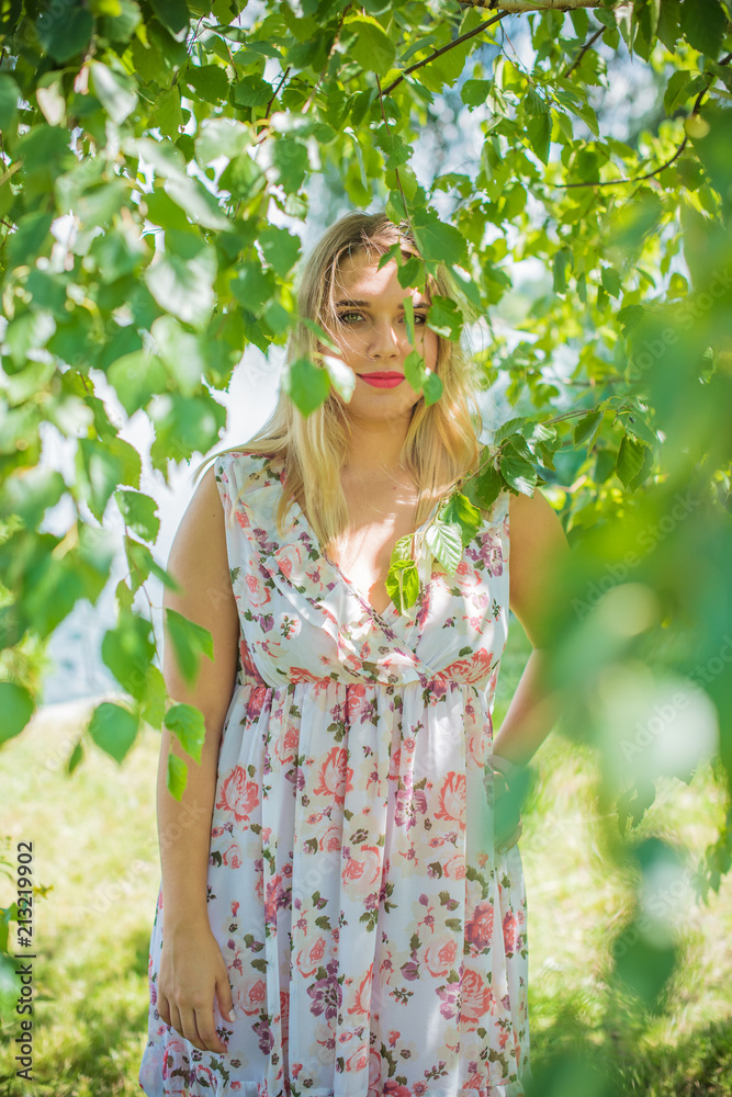 Plus size European or American sweet woman at nature, enjoy the life, walks. Life of people xl size, happy nice natural beauty woman. Concept of overweight Plus size European or American sweet woman at nature, enjoy the life, walks. Life of people xl size, happy nice natural beauty woman. Concept of overweight