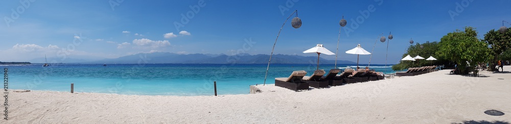 Tropical beach chair bench and umbrella paradise with white sand. Panorama holiday travel background banner Tropical beach chair bench and umbrella paradise with white sand. Panorama holiday travel background banner