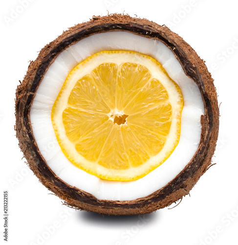 Lemon inside coconut isolated on white