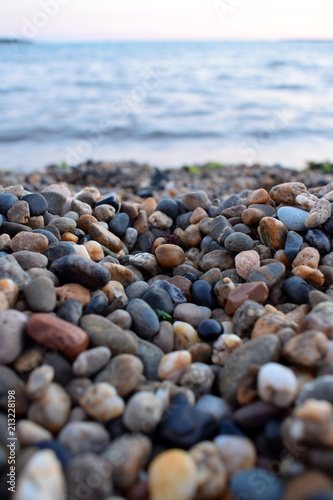 Small pebbles at the beach by the sea