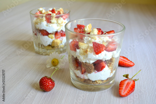 Trifle or dessert with cottage cheese and strawberries. Breakfast