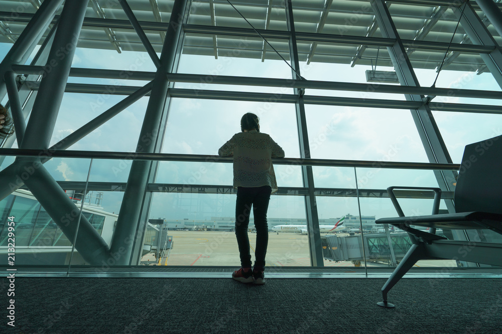 Girl waiting for her flight Girl waiting for her flight