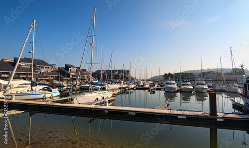 DEAUVILLE, FRANCE-MAY 05,2018: Yacht in the port of Deauville, Calvados departement in the Normandy region in France. Early morning view © evgenij84