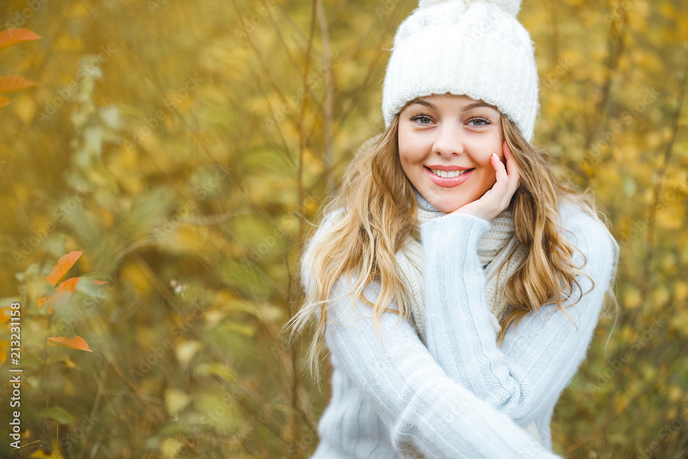 Young attractive woman in autumn colorful background Young attractive woman in autumn colorful background