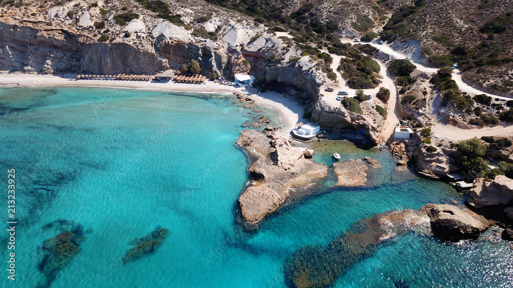 Aerial drone bird's eye view of iconic volcanic white chalk iconic beach of Firiplaka, Milos island, Cyclades, Greece