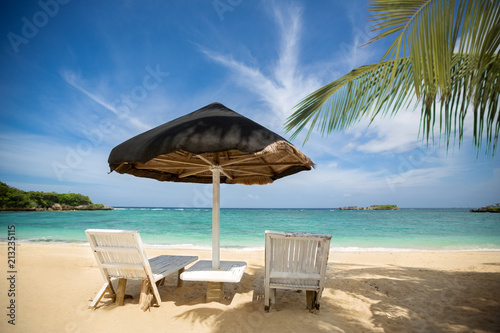 Fototapeta Naklejka Na Ścianę i Meble -  Beach chairs on beautiful sand beach