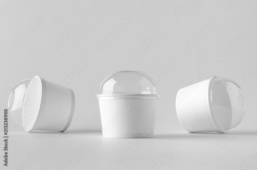White ice cream paper cup mock-up with plastic lid. White ice cream paper cup mock-up with plastic lid.