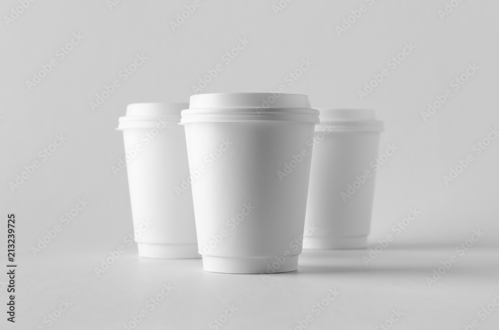 8 oz. white double wall coffee paper cup mock-up with lid. Photos | Adobe  Stock